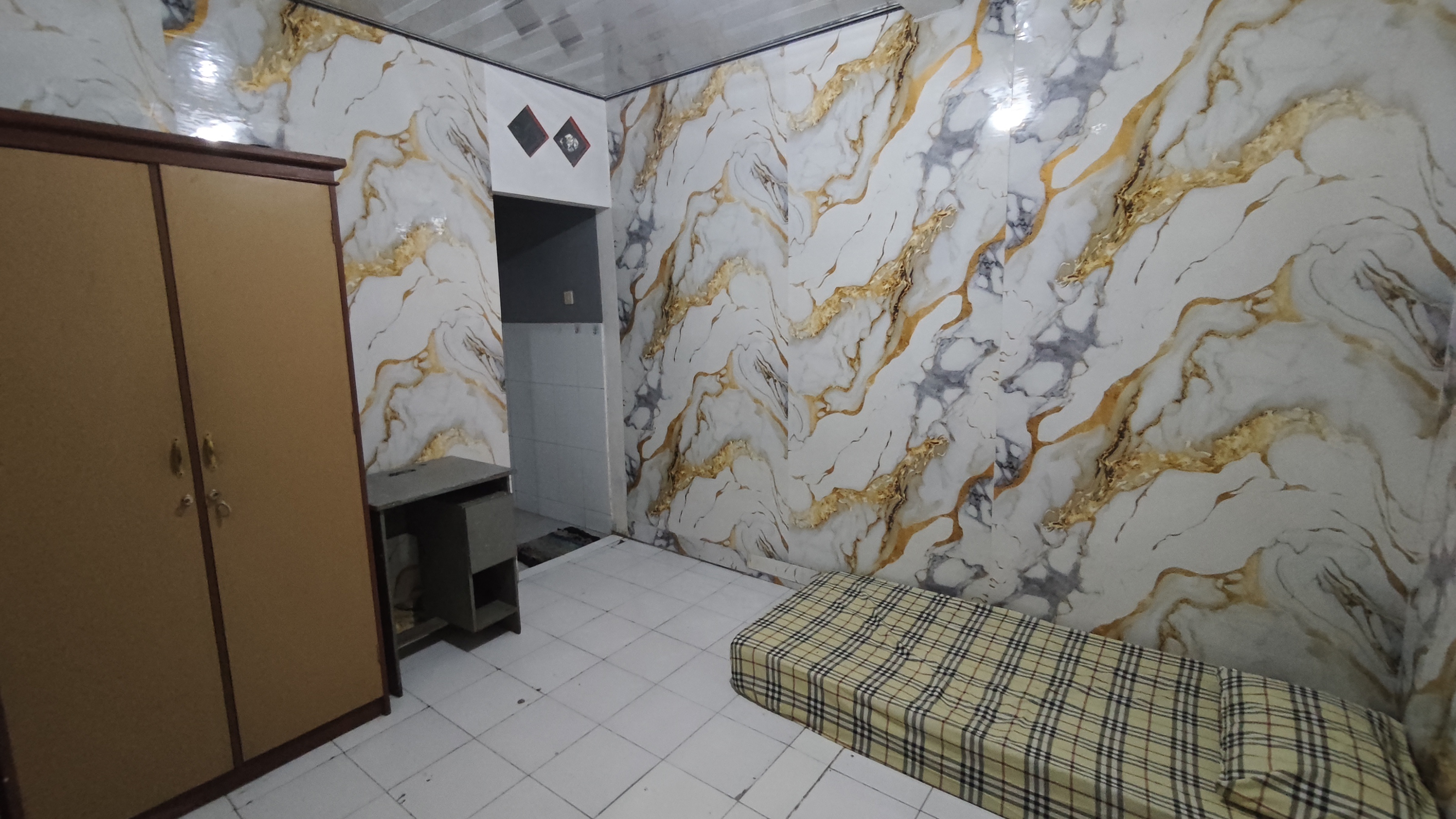 Kamar Kost Sista